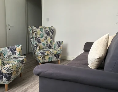 welcoming consultation area with a sofa and 2 chairs