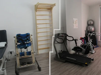 physiotherapy gym with a lot of equipment, wall bars, exercise machines