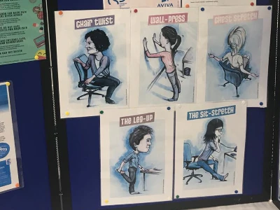 posters of stretches displayed on a noticeboard