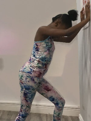 lady demonstrating calf stretches